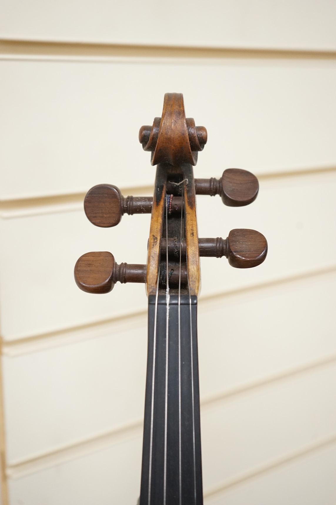 A late 18th century cased English violin, possibly after Richard Duke, length of body 35.5cm.